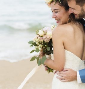 married couple on beach