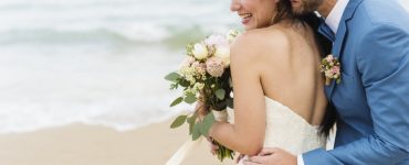 married couple on beach