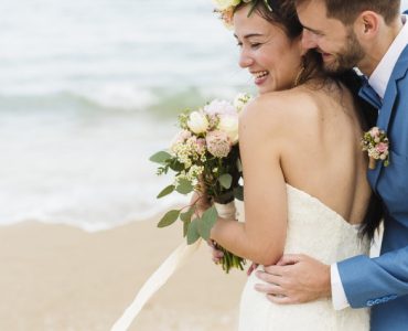 married couple on beach