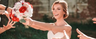 bride tossing bouquet