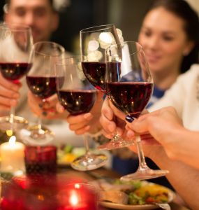 toasting at a rehearsal dinner