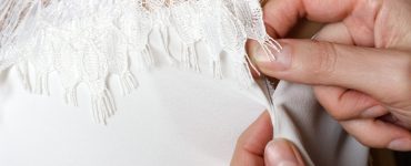 wedding dress being altered