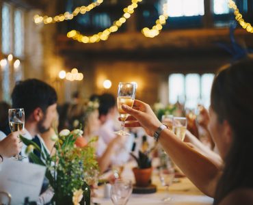 guests hearing maid of honor quotes during the toast