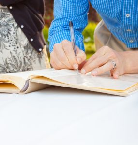 guest signing guest book