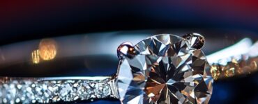 Close-up of a sparkling diamond engagement ring resting on a velvet box, symbolizing love and commitment.