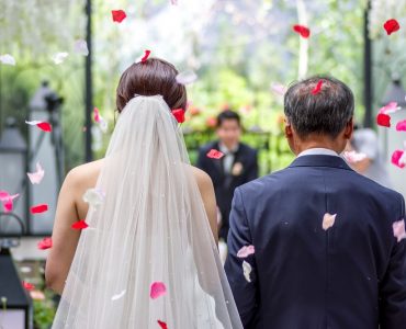 father walking bride down aisle