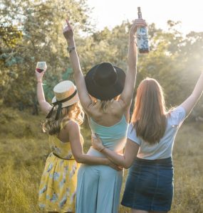 girls drinking wine