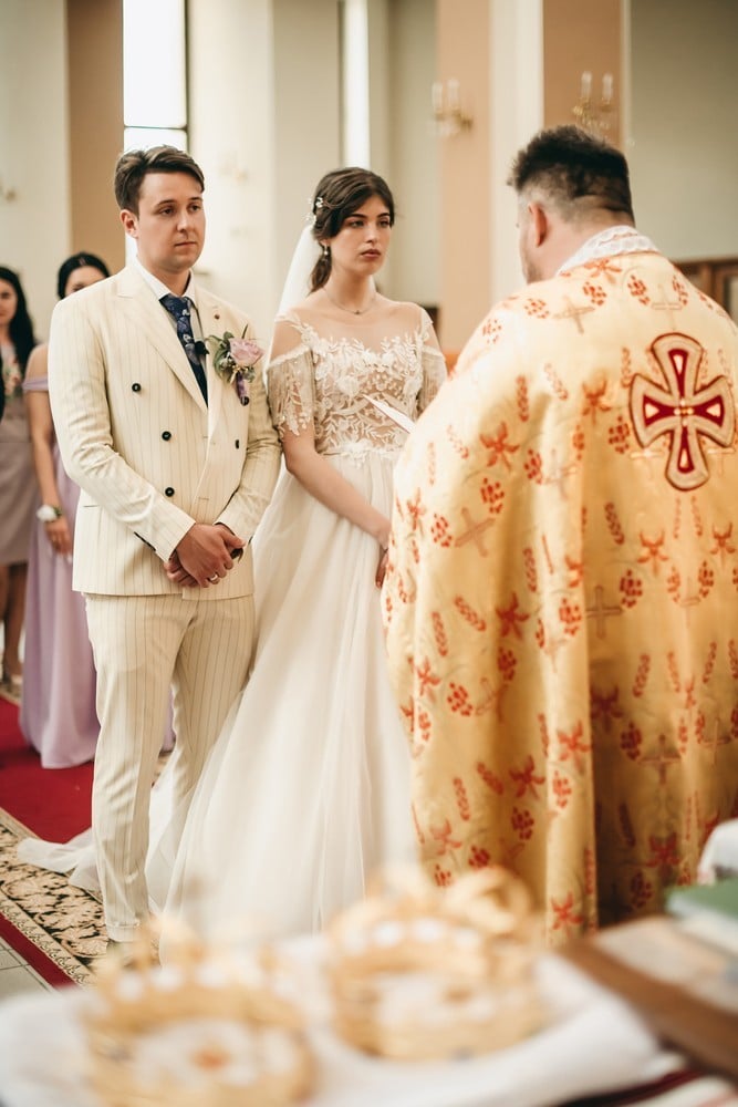 bride and groom at altar