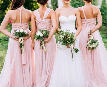 bride and bridesmaids in dresses