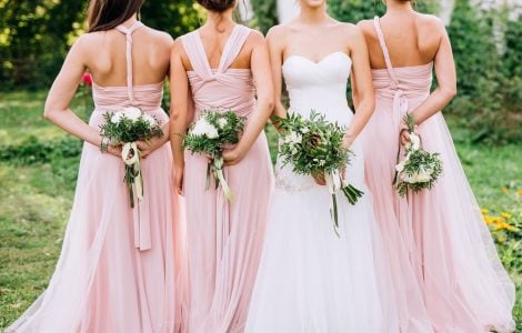 bride and bridesmaids in dresses