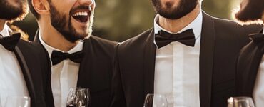 A group of groomsmen gathered around, laughing and celebrating, symbolizing the fun and excitement of planning a bachelor party.