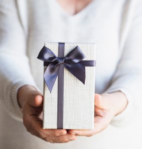 woman giving gift