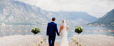 destination wedding couple looking at mountains
