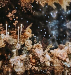 A celestial wedding inspiration board featuring dreamy nighttime skies, glowing starry décor, and elegant cosmic-themed accents.