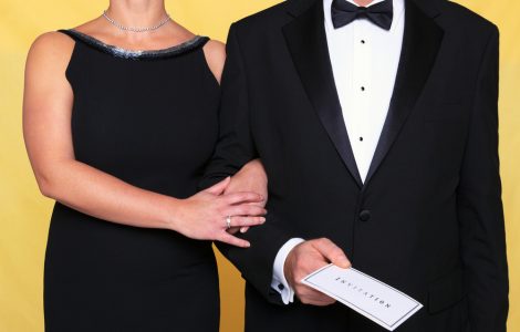 couple in black tie wedding attire