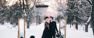 bride in black wedding dress with groom