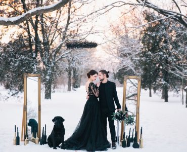 bride in black wedding dress with groom