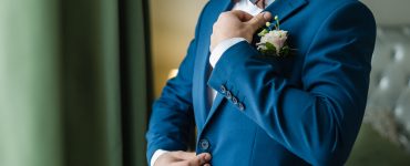 groom wearing blue tux