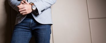 man wearing jeans and sport coat