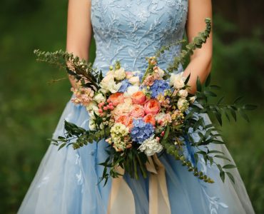 Bride holding flowers
