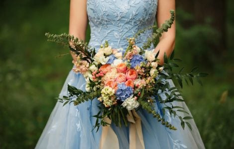 Bride holding flowers