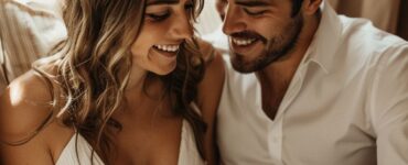 Couple looking through a photo book filled with their favorite memories together