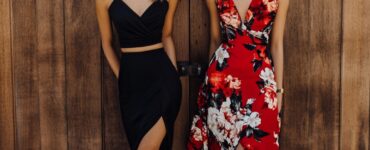 A variety of stylish cocktail wedding guest outfits, including a little black dress, bold wrap dress, floral midi dress, satin slip dress, jumpsuit, velvet cocktail dress, chiffon A-line dress, and structured off-the-shoulder dress, showcasing personal style while adhering to the semi-formal dress code.