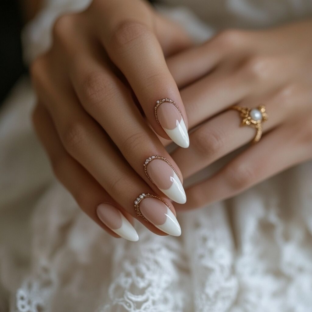 Bridal nails with a French manicure featuring colored tips that match the wedding palette, offering a playful yet polished alternative to traditional white tips.