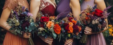 A beautifully coordinated bridal party in fall-themed dresses, showcasing a harmonious blend of vibrant and muted tones that capture the essence of the autumn season, adding charm and elegance to the wedding day.