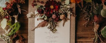 a fall wedding program showcasing various themes, from rustic burlap and lace to botanical pressed flowers, vintage jewel tones, minimalist modern calligraphy, and woodland natural elements, each designed to reflect the warmth and romance of the season.