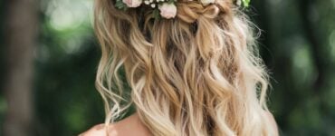 A selection of charming bridesmaid hairstyles, from romantic updos to loose waves with floral accents, perfect for enhancing the natural beauty of a garden wedding.