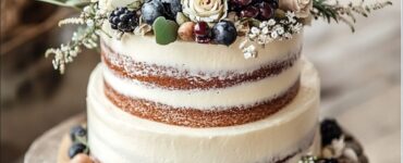 A collection of rustic small wedding cakes, each with unique designs that embody natural charm and elegance, adding warmth and a personalized touch to a romantic countryside wedding celebration.