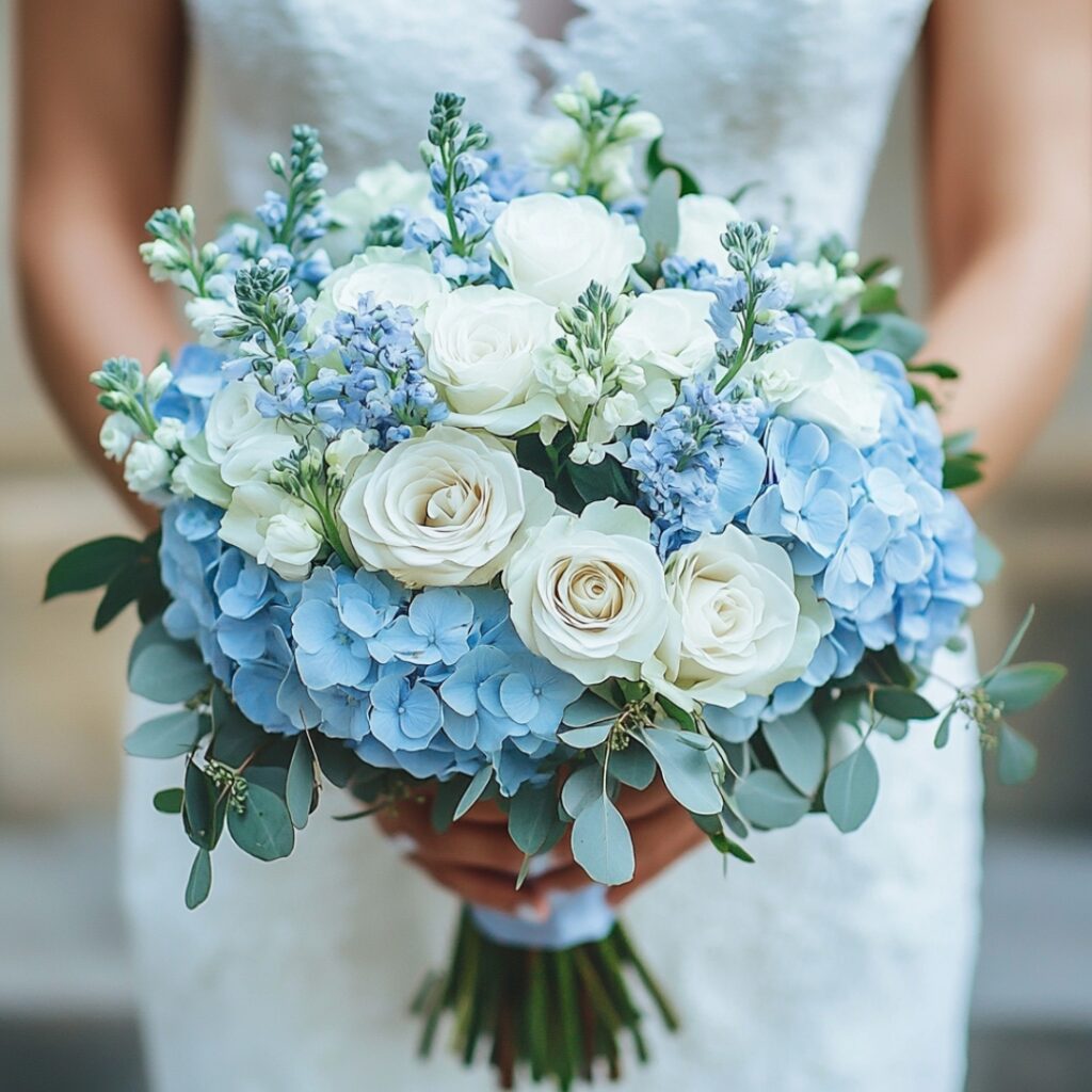 Dreamy baby blue flowers like hydrangeas and delphiniums, paired with white roses and eucalyptus, create elegant, romantic wedding bouquets and arrangements.