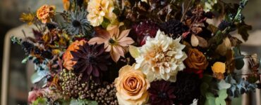 An overview of various fall floral centerpiece ideas that blend natural elements like flowers, foliage, and seasonal accents, perfect for weddings or events with rustic, boho, or elegant styles.
