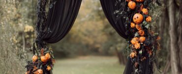 A Halloween-themed wedding arch adds gothic elegance and eerie charm, transforming your ceremony into a hauntingly beautiful, unforgettable setting that reflects your style.