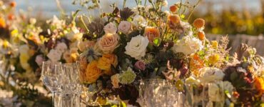 An overview of planning a September wedding that blends summer and fall elements, showcasing ideas for garden and beachfront venues with autumn touches.