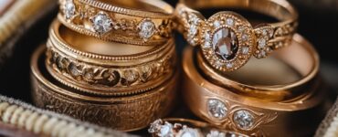 A collection of vintage wedding rings showcasing various styles from different eras, each ring representing a unique connection to the past and symbolizing enduring love.