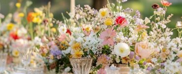 An enchanting wildflower-themed wedding setup, highlighting natural beauty and spontaneity, with delicate floral arrangements that celebrate love in a timeless, unique style.