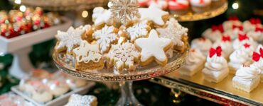 Elegant December wedding dessert table with festive holiday-themed treats, creating a warm and magical atmosphere for a memorable winter wedding experience.
