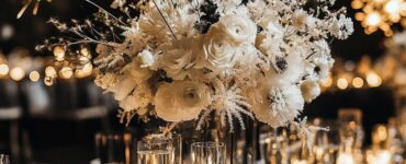 New Year's wedding celebration featuring elegant and glamorous centerpiece designs, from champagne-themed displays to firework-inspired florals, adding sparkle, glow, and midnight magic to the tables for an unforgettable start to a new chapter.