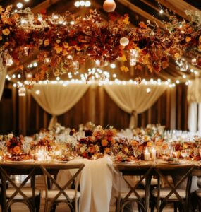 A beautifully decorated October wedding scene that combines rustic elements, warm colors, and seasonal florals, offering an inviting and memorable experience.