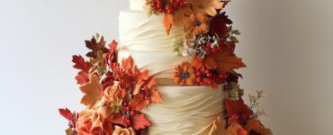 A beautifully arranged selection of Thanksgiving wedding cakes showcasing seasonal flavors and festive decorations, perfect for celebrating love and the autumn season.