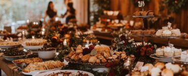 A cozy Thanksgiving wedding reception filled with warm decor, seasonal dishes, and joyful interactions, beautifully blending love and gratitude in celebration.