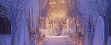 Winter wedding ceremony with aesthetic decor featuring frosted branches, candles, crystal chandeliers, and fairy lights, creating a cozy and elegant ambiance for a magical winter wonderland theme.