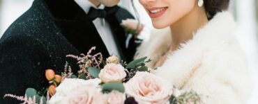 Romantic winter wedding details with a blend of luxurious colors, cozy accents, and elegant touches, creating a memorable and magical celebration in February.