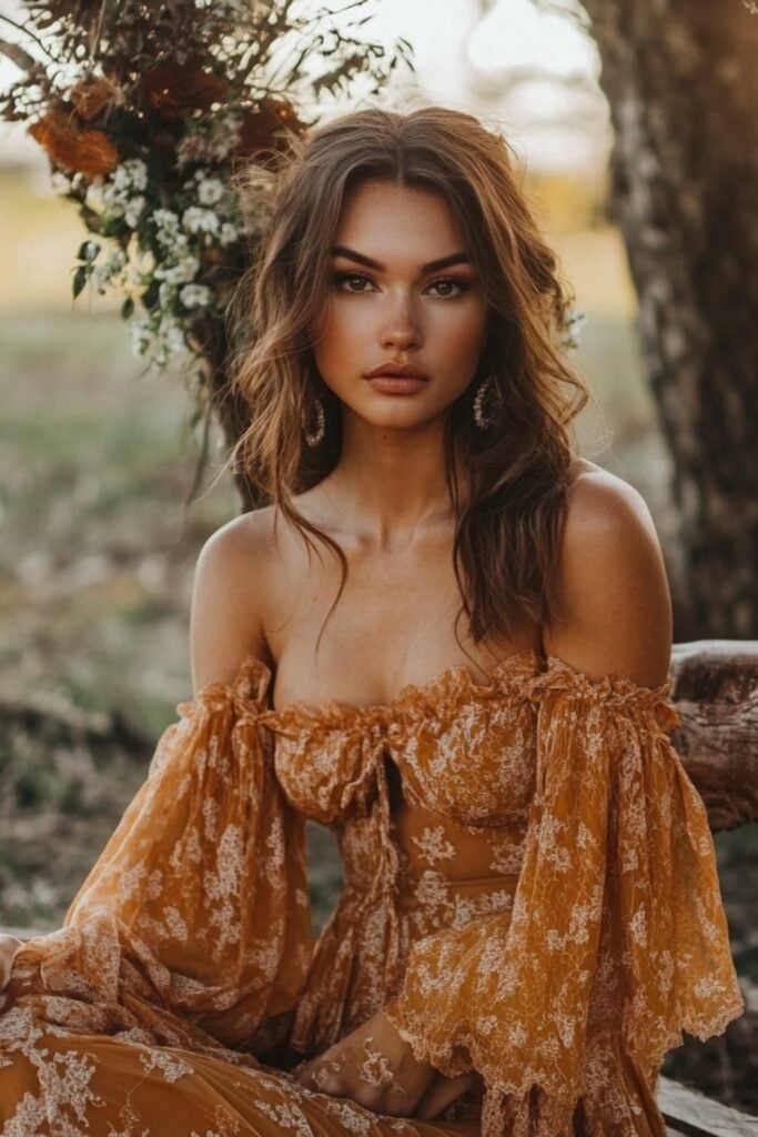 Romantic off-shoulder midi dress with flowy bell sleeves, perfect for rustic wedding guest attire in earthy hues.