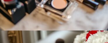 Bridal makeup essentials laid out on a vanity table, including brushes, foundation, and lipsticks, reflecting winter wedding elegance.
