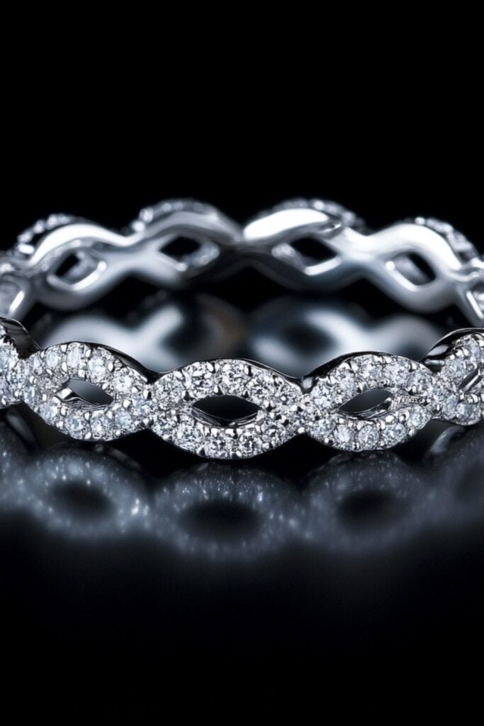 A silver eternity band with a continuous row of diamonds, symbolizing infinite love and commitment.