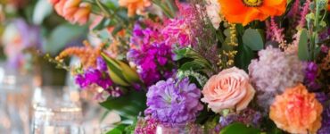 A collection of creative and vibrant centerpiece ideas for spring weddings, featuring fresh flowers, greenery, and unique decor elements to enhance your celebration.