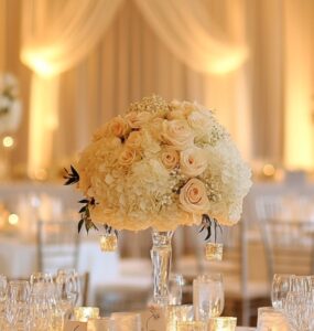 A beautifully decorated wedding reception setup with elegant and affordable décor, proving that stylish wedding tables can be achieved on a budget.